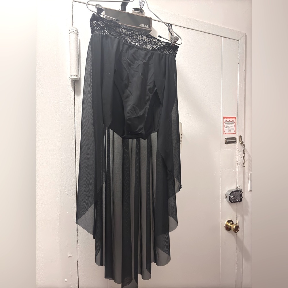 Asymmetrical High low dance rave skirt with attached underwear bottoms. Size L.